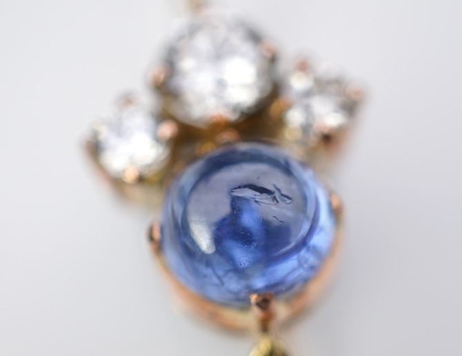 A pair of sapphire and diamond drop earrings